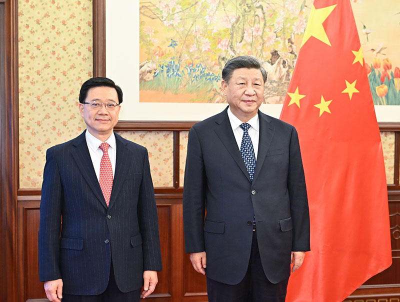习近平会见来京述职的李家超
